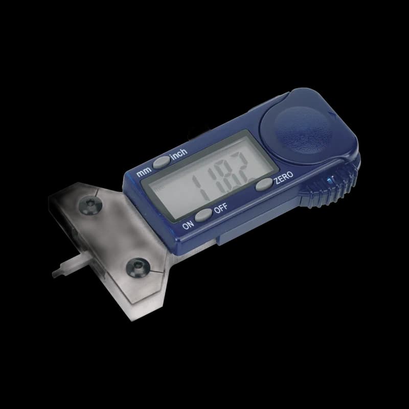 Digital tyre-tread and brake-pad depth gauge with calibration block