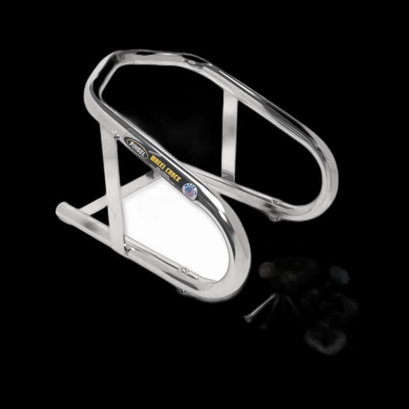 Motorcycle wheel chock with tie-down anchors