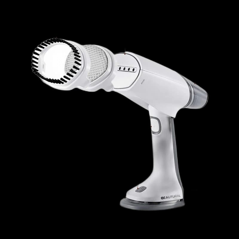 Portable garment steamer with lint-brush head